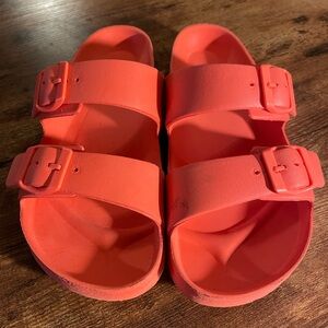 Woman’s size 7 coral color sandals